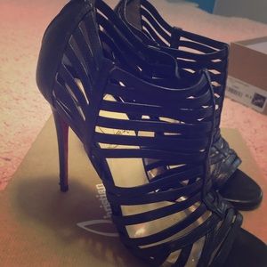 black Louboutin’s with original box and receipt